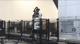 GIF of Hadrian robot transporting parts to and from machines